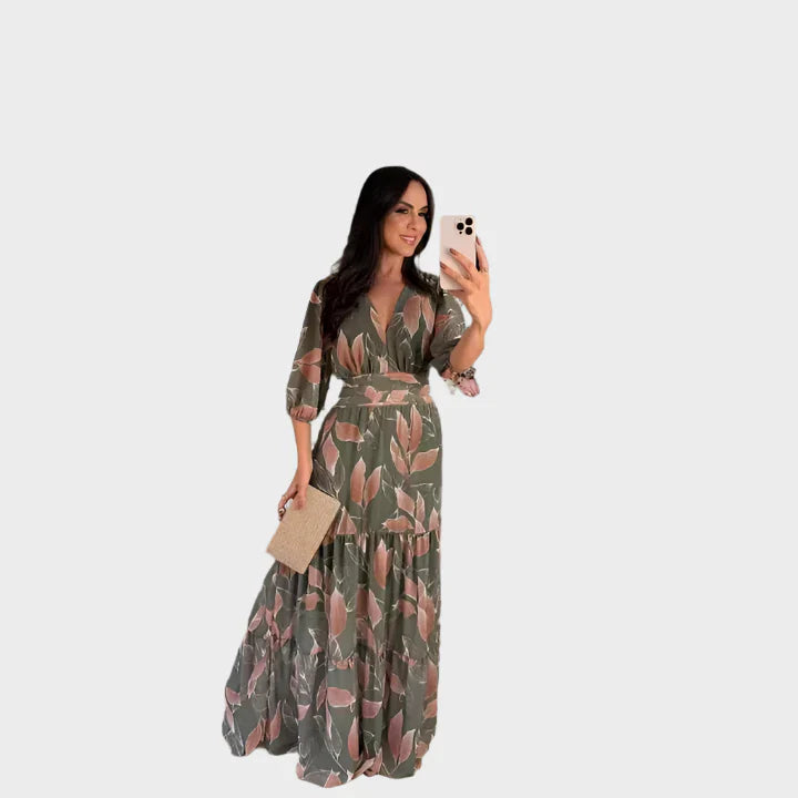 Dolga obleka s cvetličnim vzorcem in udobno silhueto za elegantne dni